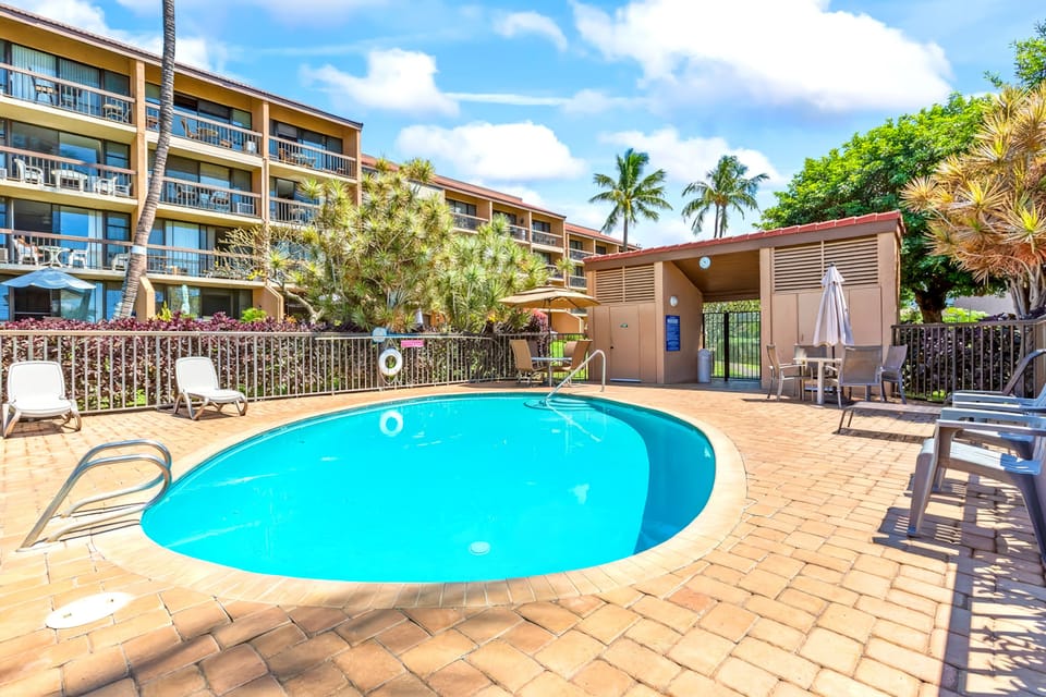 Refreshing pool surrounded by lounge chairs