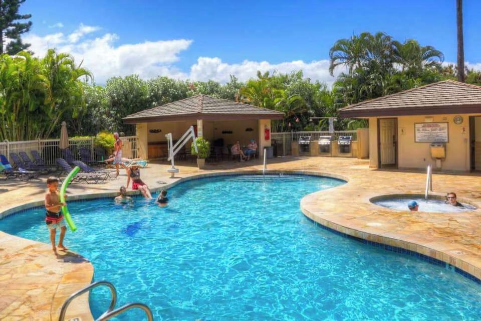 Relax poolside and soak up the warm Hawaiian sunshine