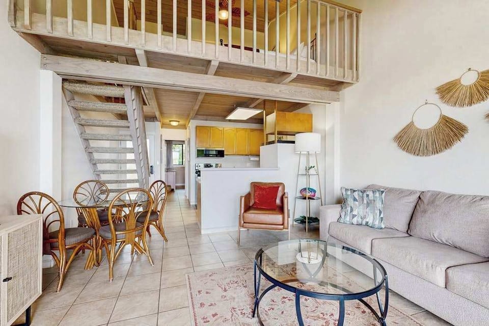 Living room open to the kitchen and dining room.