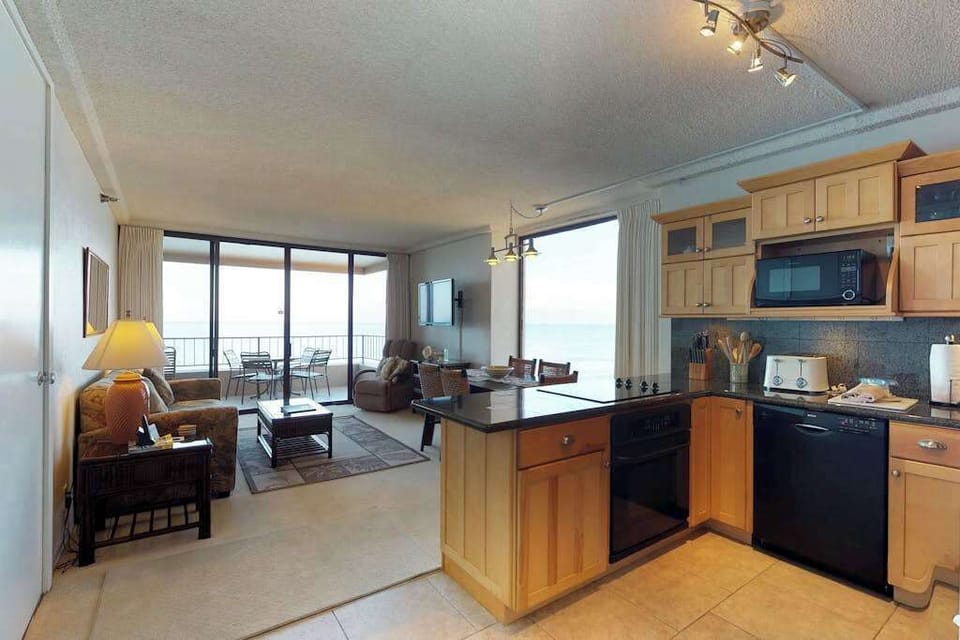 Fully stocked kitchen open to the rest of the unit with this open concept feel, lots of natural light.