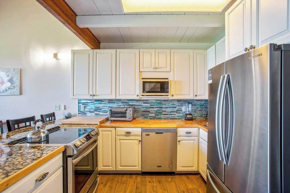 Newly remodeled kitchen with stainless steel appliances.