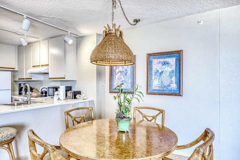 Sunny Dining Space For Island Gatherings