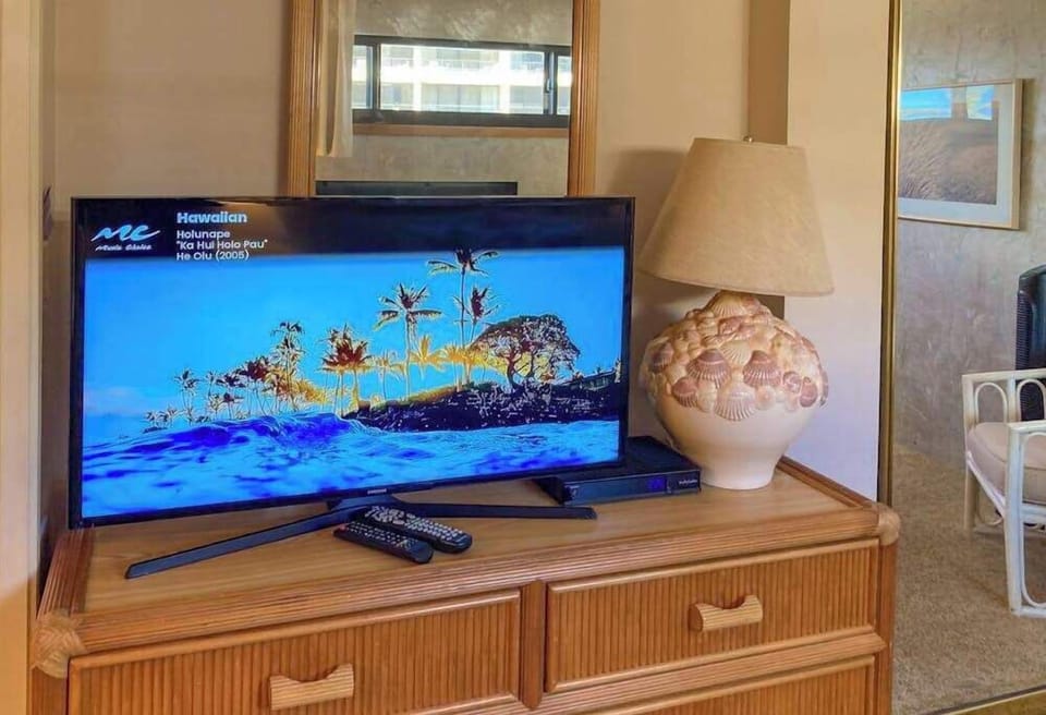 Bedroom With Smart TV And Cozy Ambiance