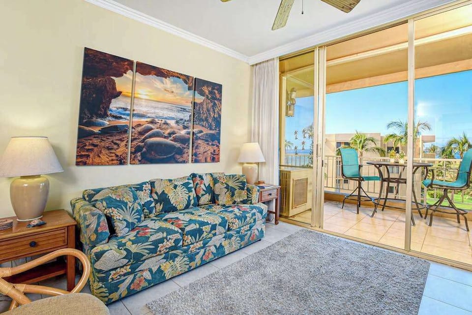 Unwind into vacation mode on a sleeper sofa in the living area. In the evening, kick back and stream a movie on the 65” smart TV. Slide open the glass door to the lanai for the soothing sound of the surf. 