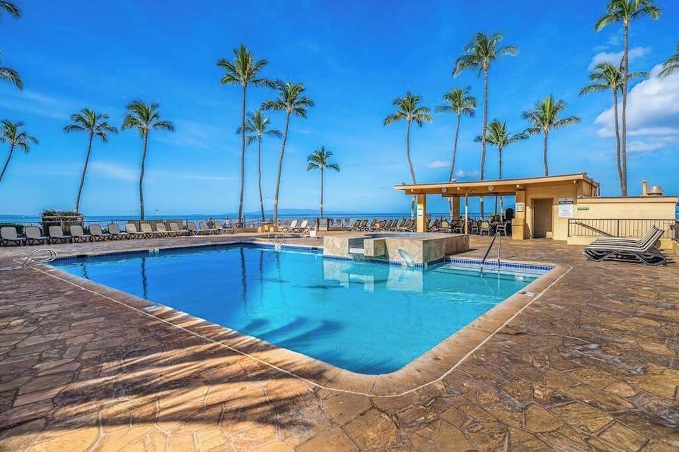 Poolside Oasis Overlooking The Ocean