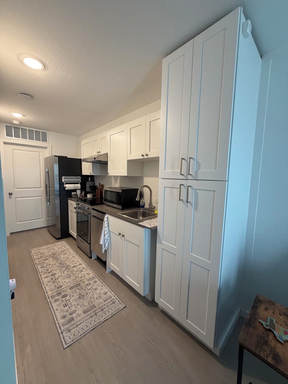 Full refrigerator, range, microwave, kitchen utensils, etc.