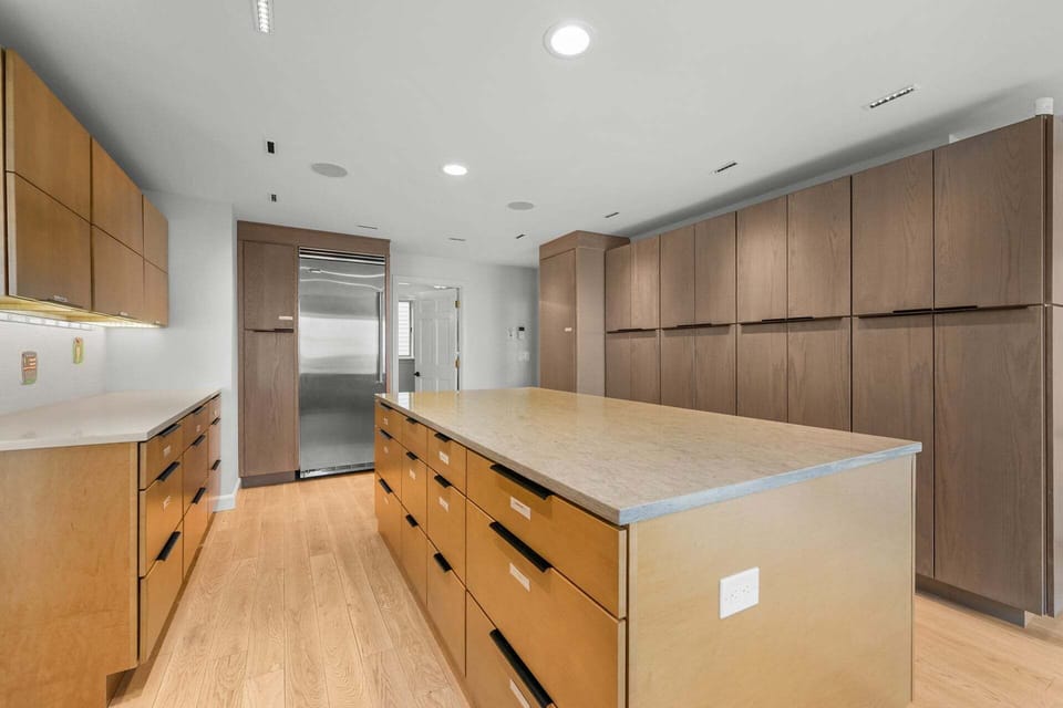 Well-appointed kitchen with abundant pantry storage,
