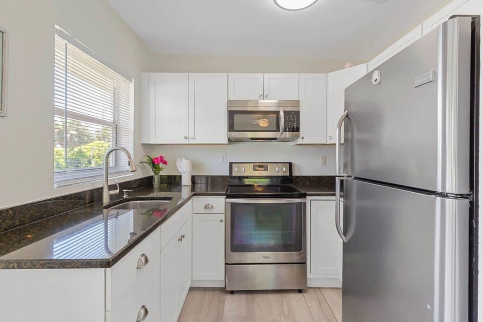 Granite countertops with full kitchen setup