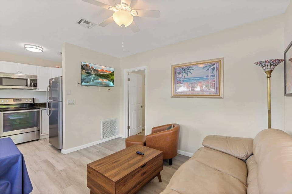 Smart TV across from sofa seating