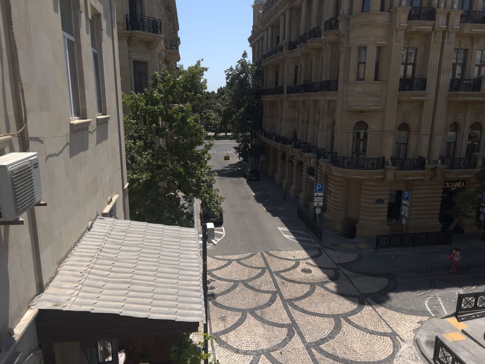 Real street and boulevard-area view from the apartment.