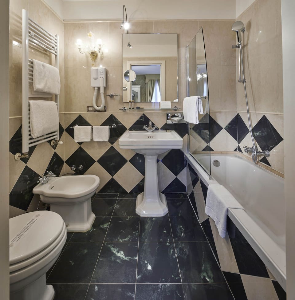 Free toiletries, hair dryer, bidet, towels