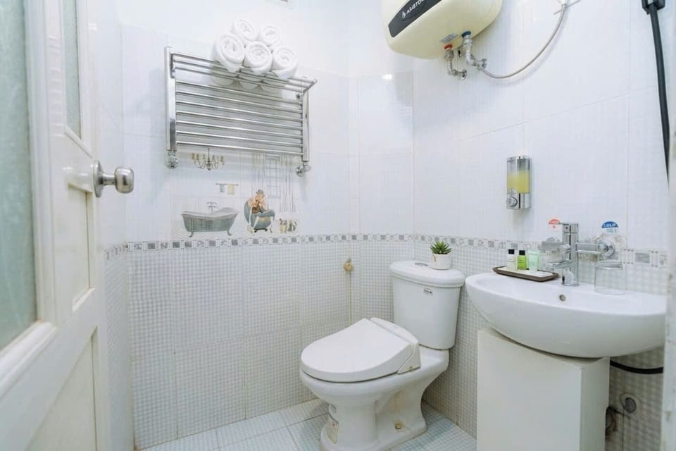 Shower, free toiletries, hair dryer, slippers
