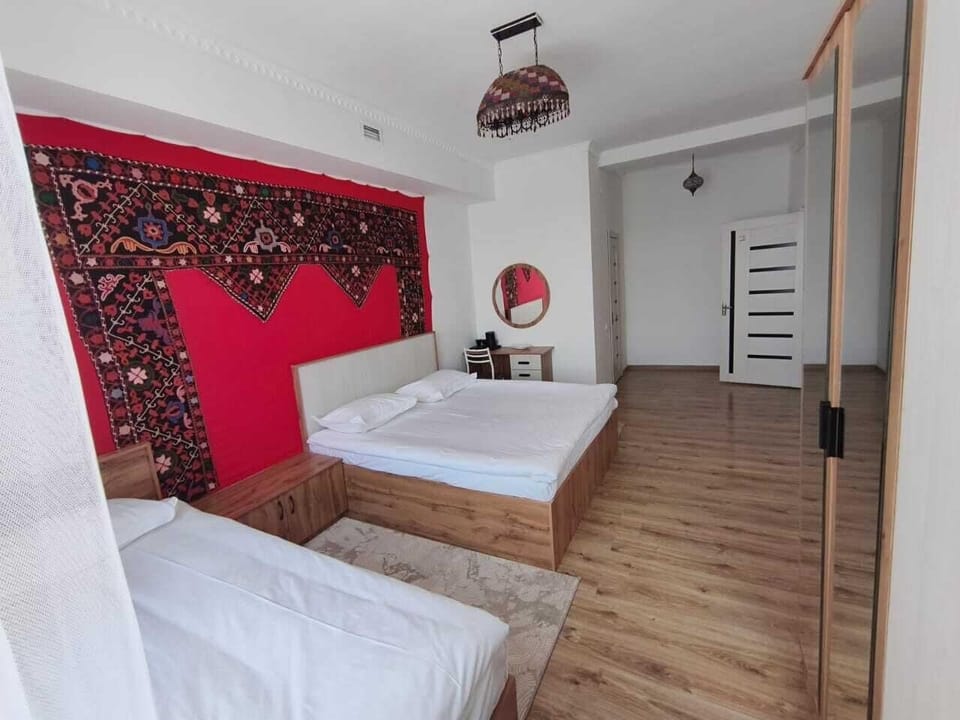 Family Triple Room | Desk, laptop workspace, WiFi (free), bed sheets