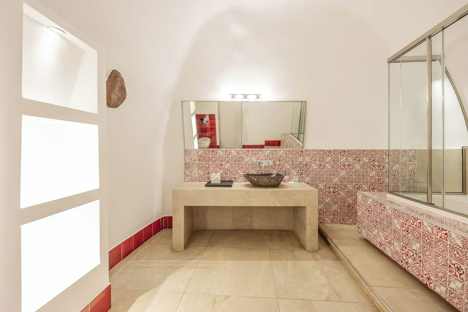 Shelter Suite | Bathroom | Hair dryer, slippers, towels, soap