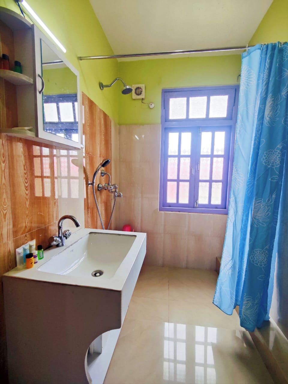 Family Studio Suite, Hill View | Bathroom | Shower, free toiletries, slippers, towels