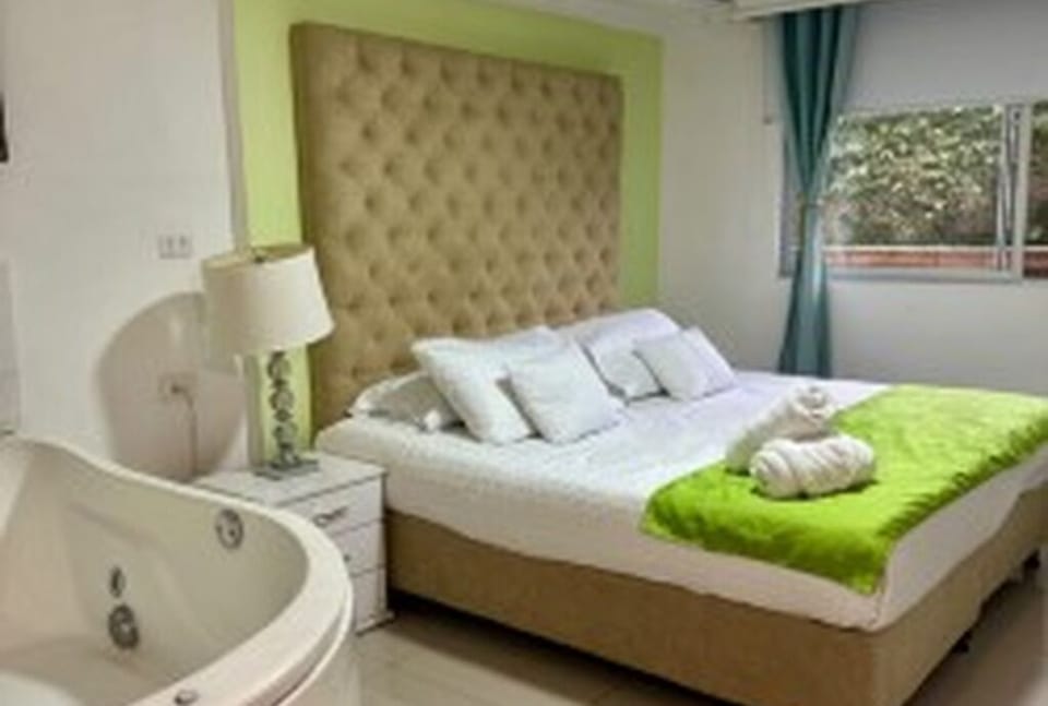 Luxury Suite, Garden View | Desk, WiFi (free)