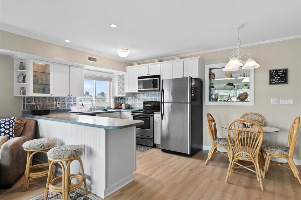 Prepare your favorite vacation meals in this spacious, modern kitchen designed with convenience in mind.