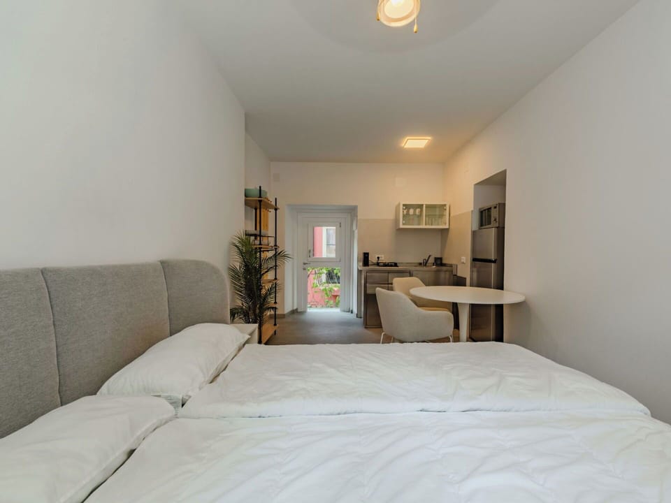 Furniture, Interior Design, Bed, Wall, Flooring, Floor, Bedroom, Room, Wood, Ceiling