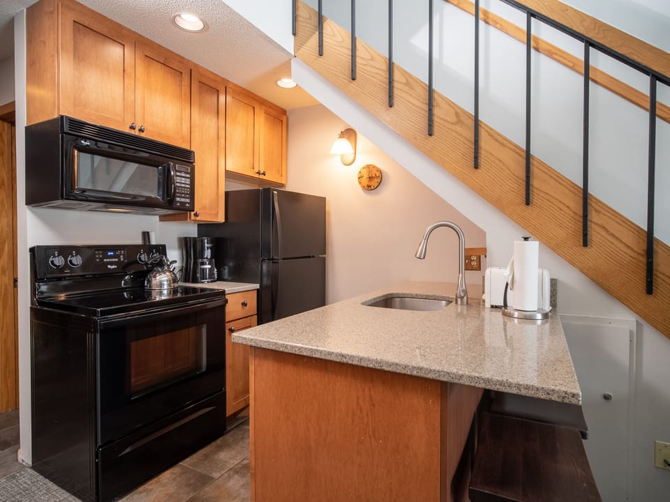 Alpine Condo | Private kitchen | Coffee/tea maker, fridge, microwave, oven