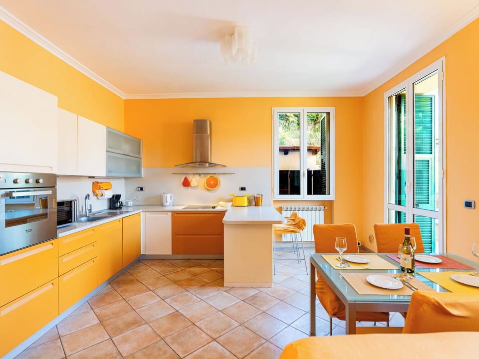 Interior Design, Furniture, Kitchen, Flooring, Countertop, Ceiling, Floor, Home, Chair, Orange