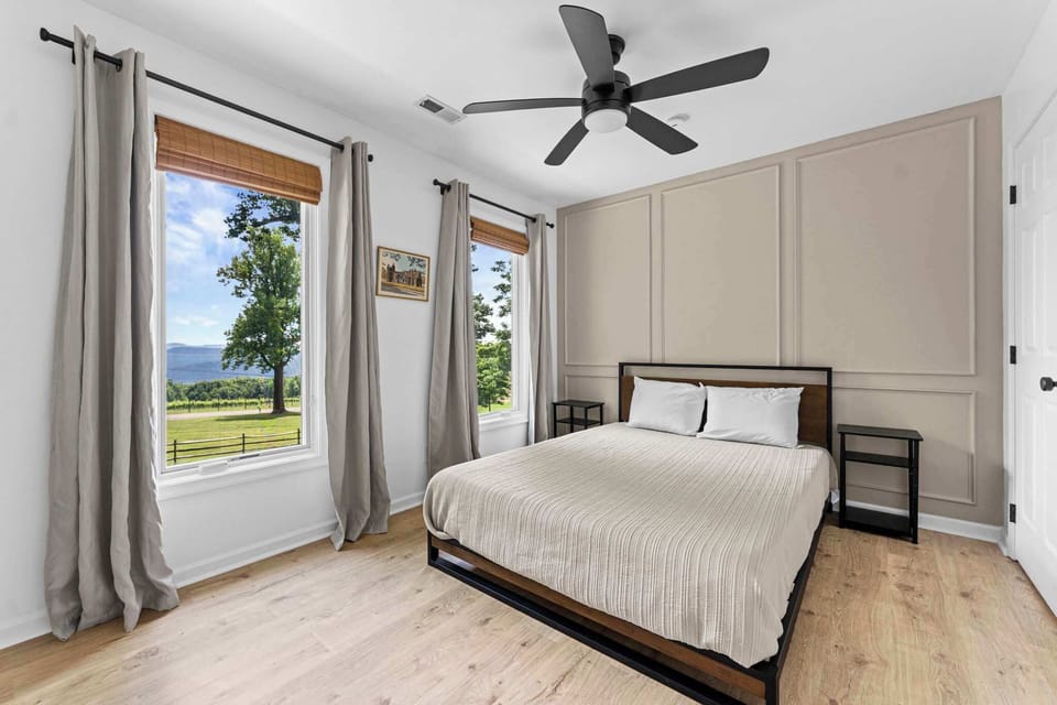 Bedroom 2 (Upper Level): Queen bed, Ceiling fan with private attached bathroom
