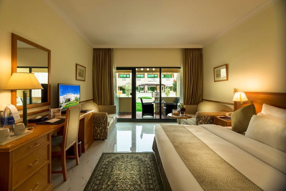 Standard Room, Multiple Beds | Minibar, in-room safe, desk, laptop workspace