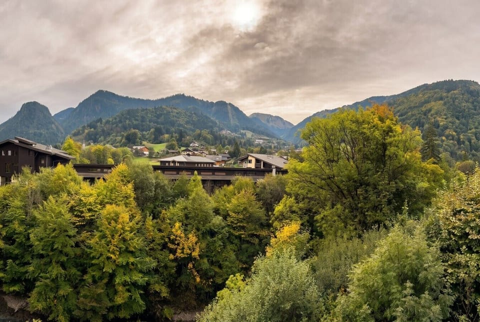 Gaze out over rolling green hills and alpine peaks from your window.