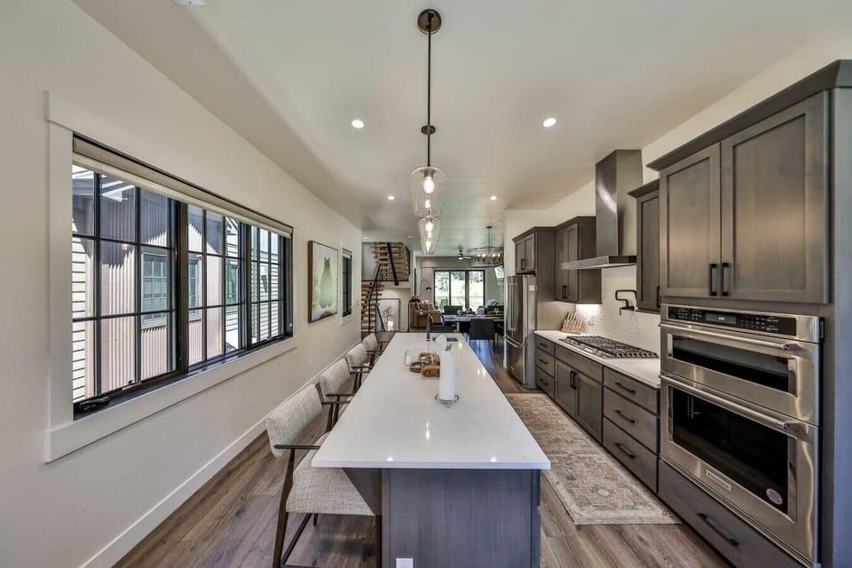 Gourmet kitchen with island and bar seating