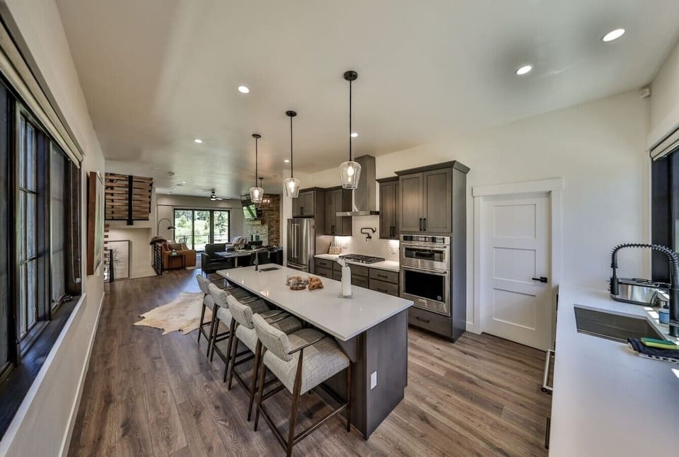 Gourmet kitchen with island and bar seating