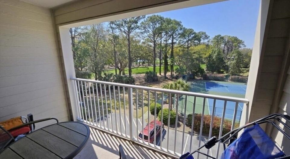 Watch some pickle ball or tennis matches right from the balcony