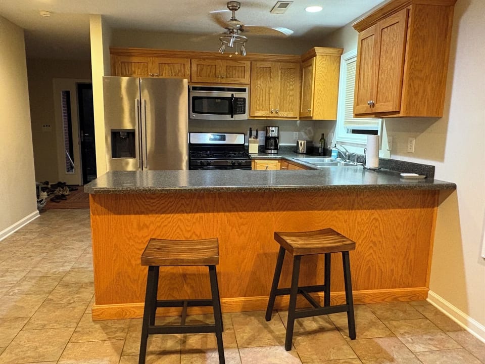 Kitchen with two counter-height stools