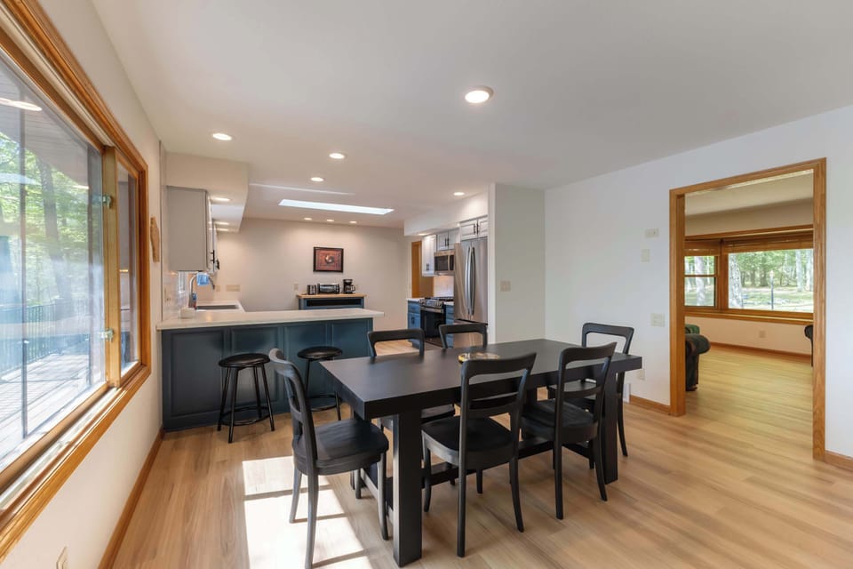 Dining table with seating for 6- Stainless Steal appliances in newly updated kitchen