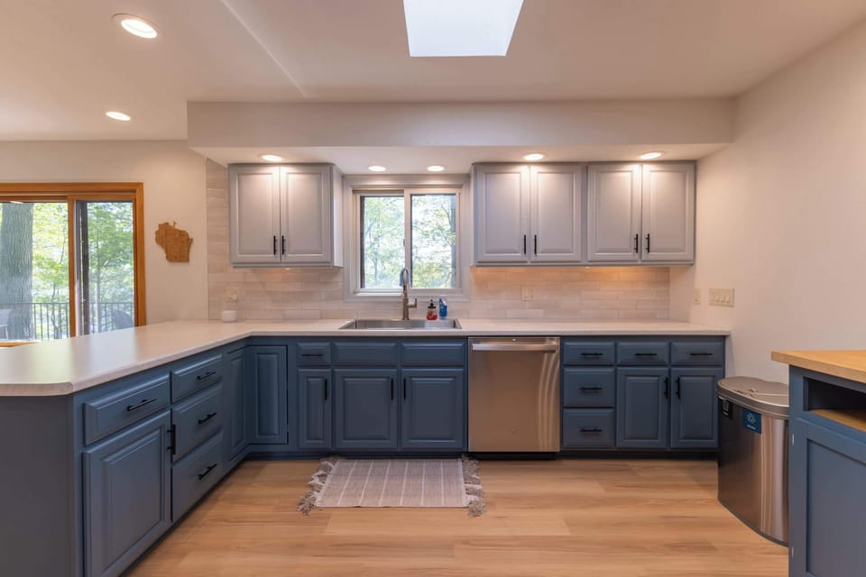 Views of the lake from kitchen sink. Stainless Steal appliances in newly updated kitchen
