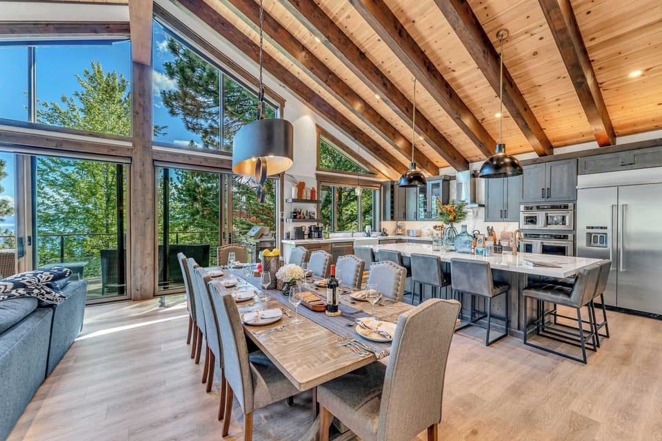 Dining area with seating for 8 at the table and 6 at the island
