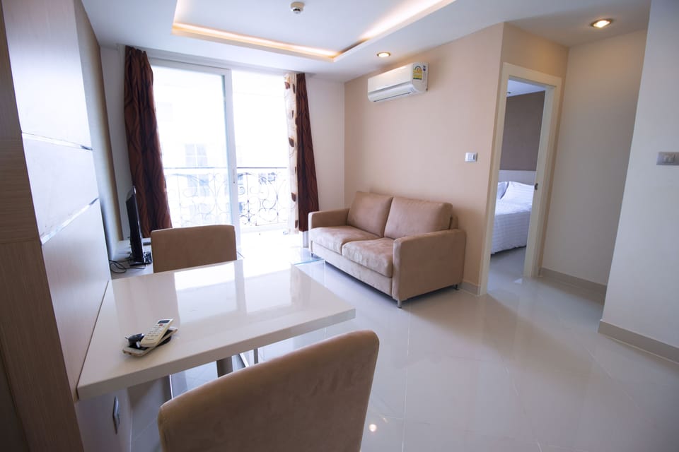 One Bedroom Apartment  | Living room | Flat-screen TV