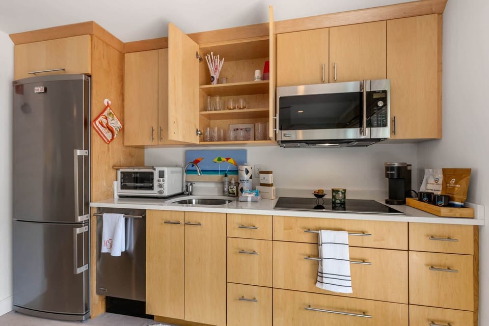 The sleek kitchen is well equipped for an unforgettable getaway​