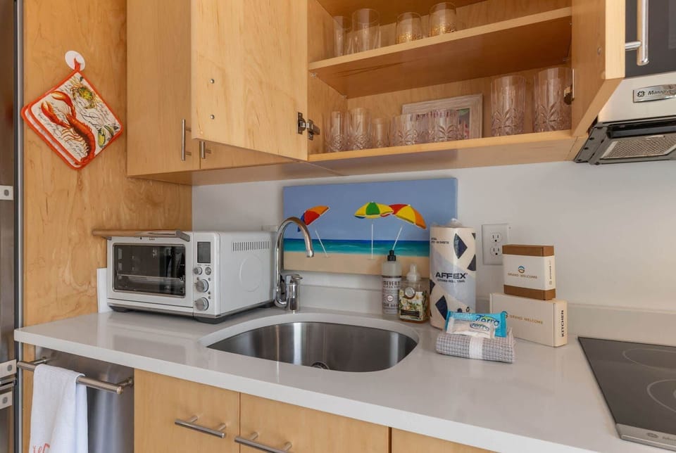 The sleek kitchen is well equipped for an unforgettable getaway​