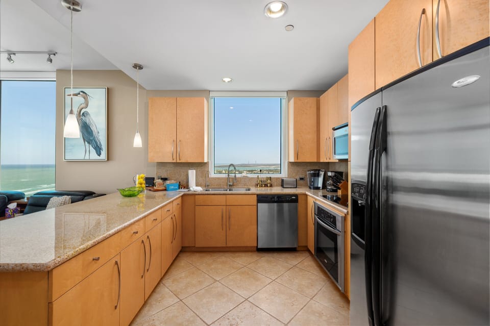 Prepare meals with beautiful gulf views from the fully equipped kitchen.