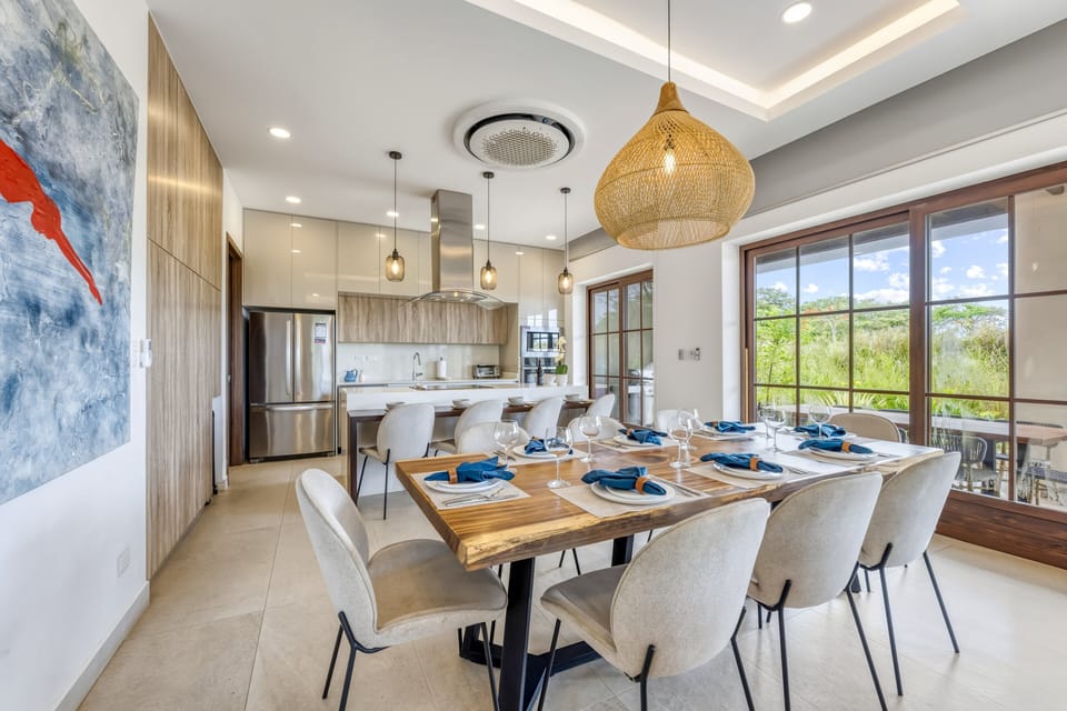 From the kitchen island to the dining table for eight, this is a space that makes group travel feel effortless and elevated all at once.