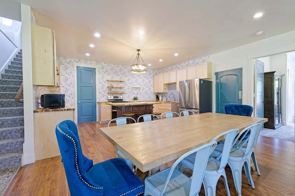 Modern kitchen with pendant lighting, island, and quality appliances.