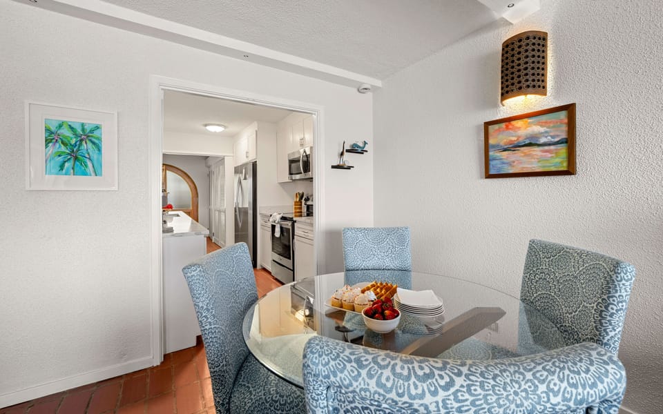 Comfortably seating for four, this inviting dining space is perfect for sharing vacation memories.