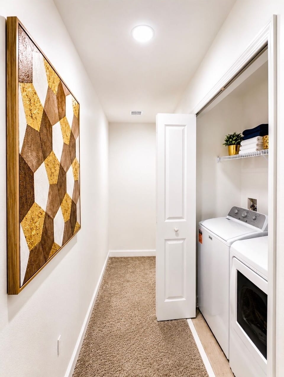Convenient in-unit washer/dryer with clean, modern hallway styling