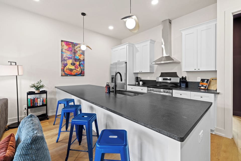 Plenty of counter space and bar stools for quick bites or hanging out.