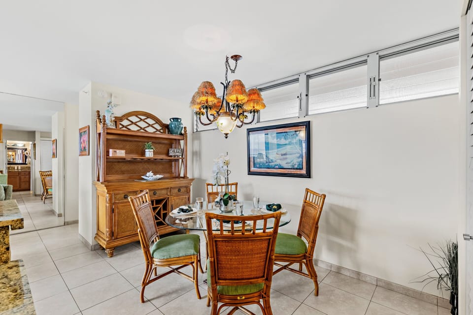 The dining room provides ample seating for sharing meals and planning your Maui adventures.