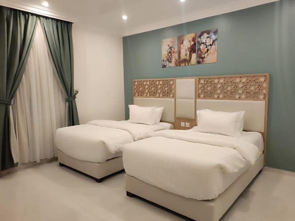Family Suite | Hypo-allergenic bedding available, pillowtop beds, in-room safe
