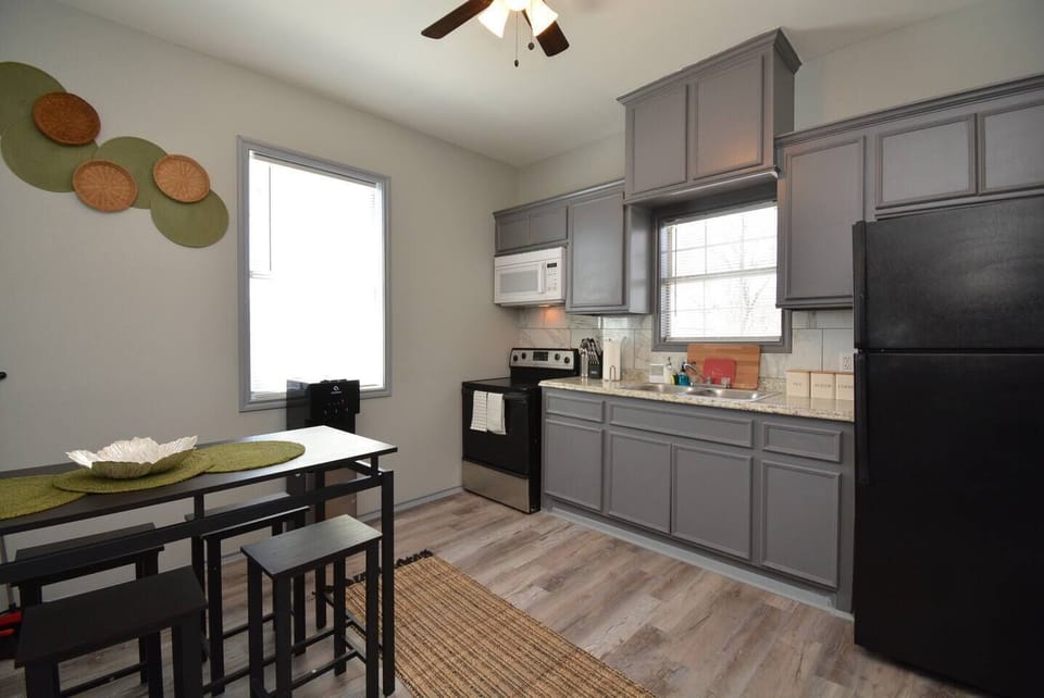 Full kitchen with all utensils and cookware