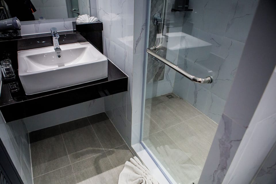 Shower, towels, soap, shampoo