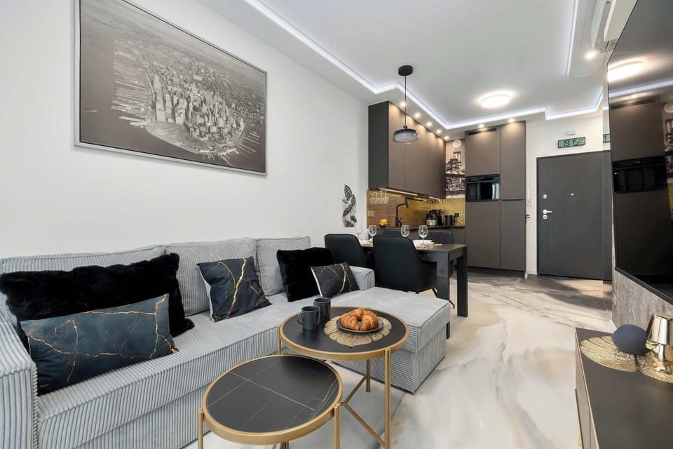 A spacious lounge area designed for comfort and relaxation. The modern interior creates a warm and inviting atmosphere.