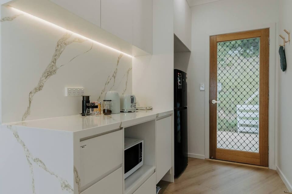 Enjoy your choice of coffee or tea, complemented by a toaster for preparing a quick and delicious breakfast.