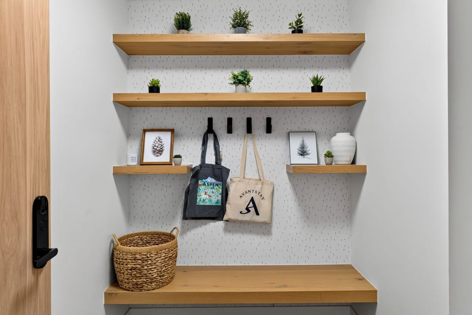Dedicated entry mudroom bench with built-in storage.